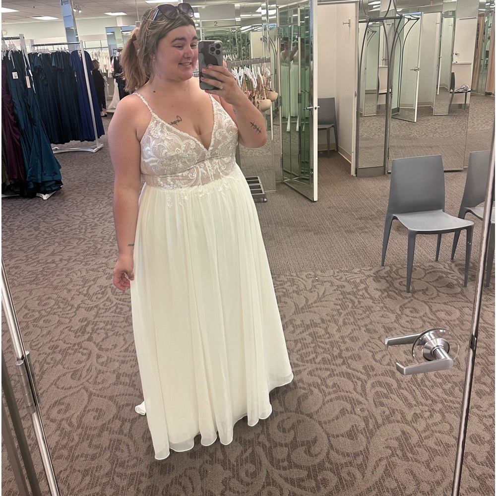 Brand new never worn wedding dress tags still on , moved our wedding